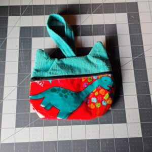 Eco friendly up-cycled skittles/dino cat purse